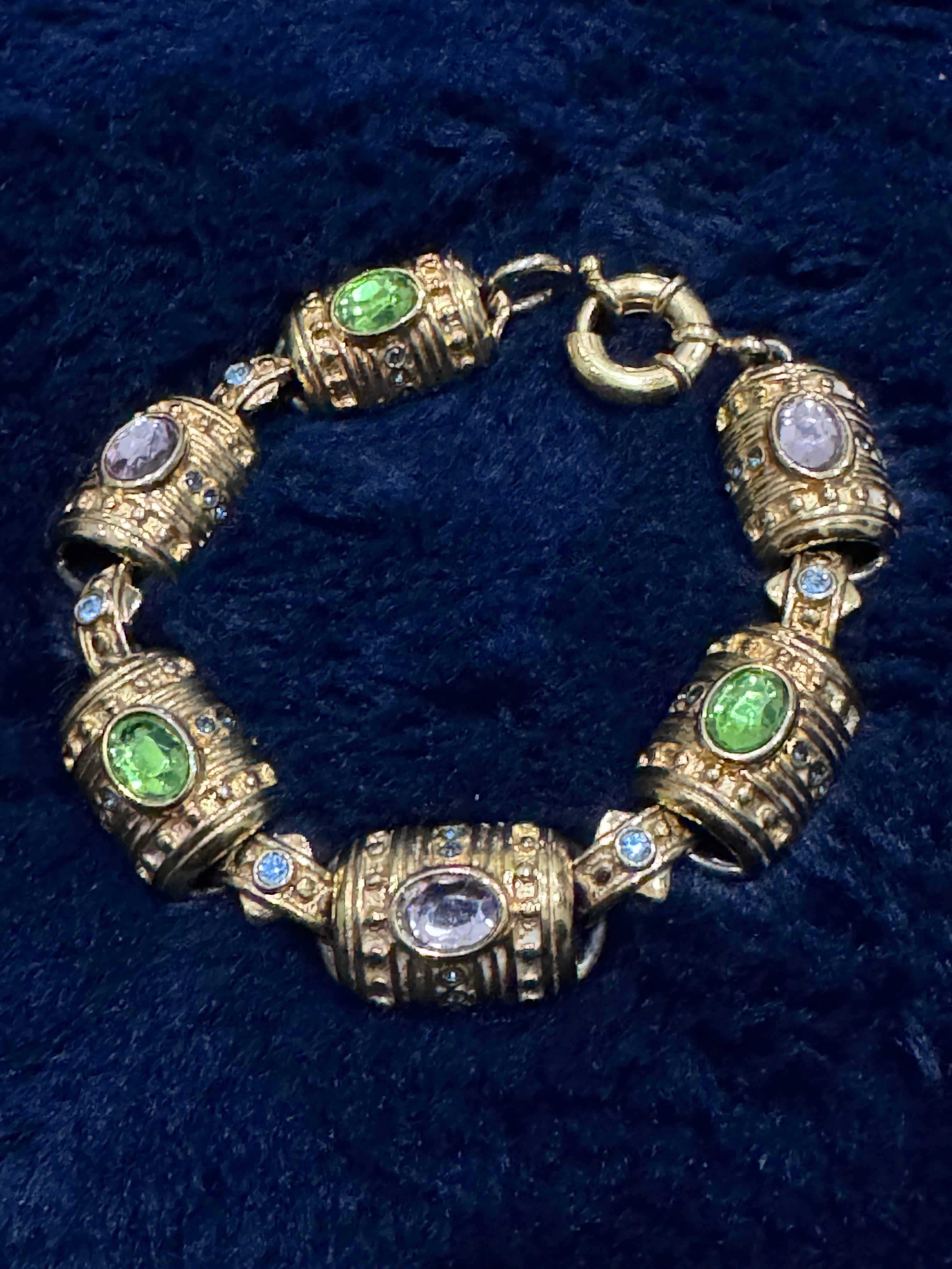 Premier Designs gold-toned barrel link bracelet with pastel green, purple, and blue rhinestones
